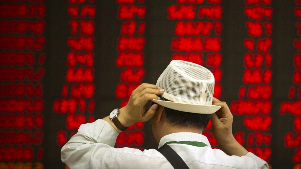 Stock prices at a brokerage house in Beijing