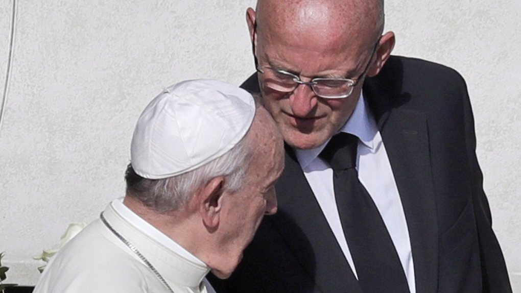 Domenico Giani, right, and Pope Francis