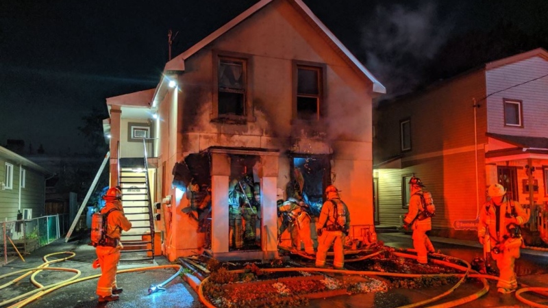 Firefighters respond to a call for a fire at 225 Deschamps Ave. in Vanier at around 12:00 a.m. Friday, Oct. 18, 2019. (@OFSFirePhoto/Twitter)