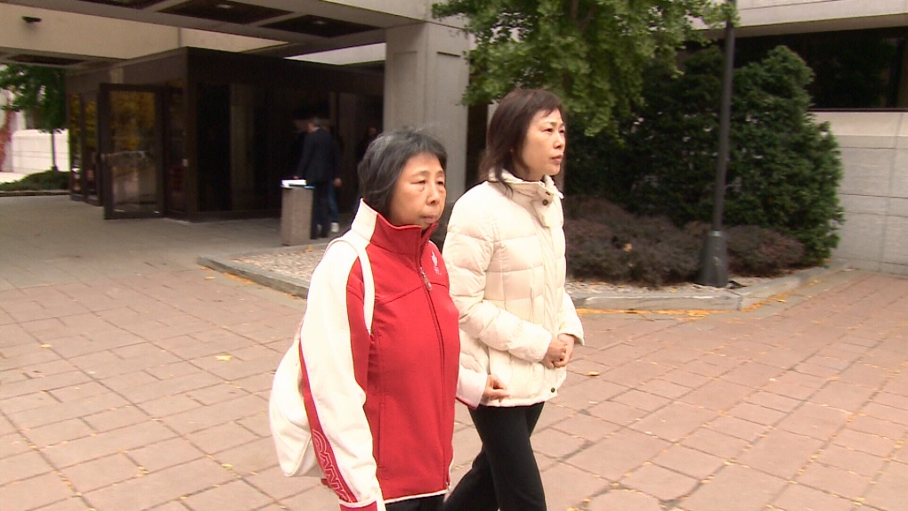 Jenny Wu, on the right, leaves Ottawa court.