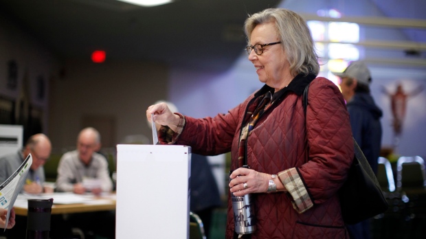 Green Party Leader Elizabeth May casts her vote at St. Elizabeth's Parish while in Sidney, B.C., on Monday, Oct. 21, 2019. THE CANADIAN PRESS/Chad Hipolito