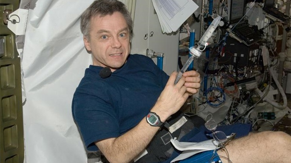 Canadian Space Agency Astronaut Bob Thirsk conducts a test on board the International Space Station on Aug. 4, 2009. Thirsk arrived on the space station in May and is currently in the middle of a six-moth assignment on the space station. (NASA) 