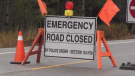 An emergency road closed sign