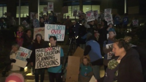Dozens of parents and children rallied outside the Vancouver School Board's meeting on Monday.