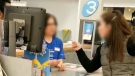 A still image from video captured by a customer named Allen shows a racist tirade at a Shoppers Drug Mart in Burnaby, B.C., on Monday, Oct. 28, 2019. 