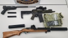 Guns seized from a home in Saugeen Shores, Ont. on Wednesday, Oct. 30, 2019 are seen in this image provided by Saugeen Shores police.