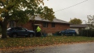 A car crashed into a house after hitting another vehicle in London, Ont. on Thursday, Oct. 31, 2019. (Bryan Bicknell / CTV London)