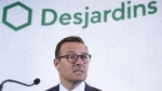 Desjardins President and CEO Guy Cormier reads a statement during a news conference in Montreal on June 20, 2019. THE CANADIAN PRESS/Paul Chiasson