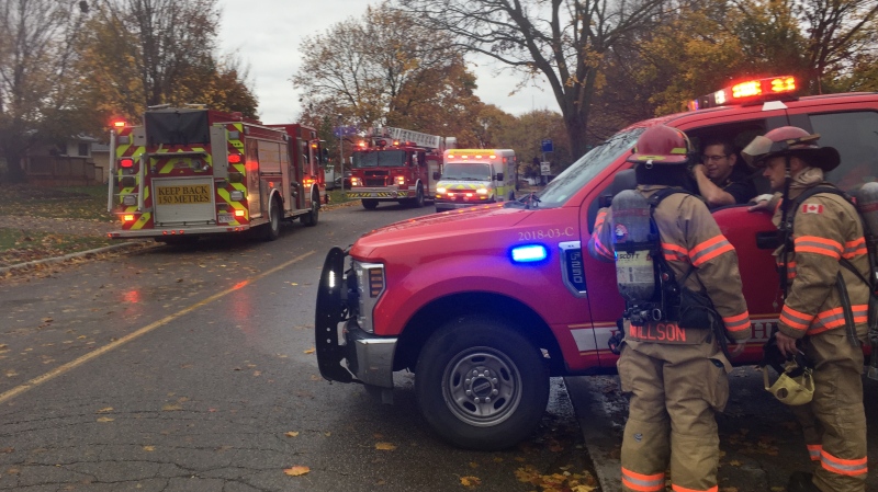 Firefighters work at the scene of a morning fire in southwest London, Ont. on Friday Nov. 1, 2019. (Bryan Bicknell / CTV London)