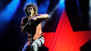 Zack de la Rocha of the band Rage Against the Machine performs during the band's headlining set at the "L.A. Rising" concert at the Los Angeles Coliseum, Saturday, July 30, 2011, in Los Angeles. (AP Photo/Chris Pizzello)