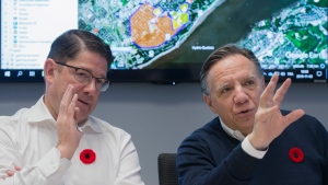 Quebec Premier Francois Legault, right, and Hydro Quebec President and CEO Eric Martel update news media on the ongoing power outages in the province during a briefing in Montreal, Saturday, November 2, 2019. THE CANADIAN PRESS/Graham Hughes