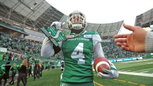 Saskatchewan Roughriders linebacker Cameron Judge is awarded the big play chain after a fourth quarter pick six during second half CFL action against the Edmonton Eskimos, in Regina, Saturday, Nov. 2, 2019. THE CANADIAN PRESS/Mark Taylor