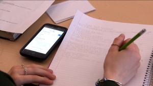 A cell phone is seen being used by a student in this undated file image. (CTV News Toronto)