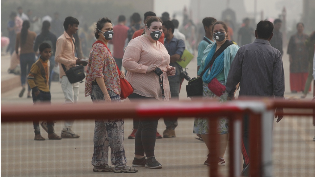 Wearing pollution masks in New Delhi, India