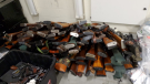 A pile of guns recovered from a home in Kitchener. (Source: WRPS)