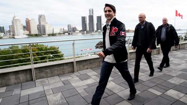 A view of the city of Detroit, provides a backdrop as Liberal leader Justin Trudeau leaves after speaking at an event at St. Clair College in Windsor, Ont., on Monday Oct. 14, 2019. THE CANADIAN PRESS/Sean Kilpatrick