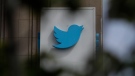 This July 9, 2019, file photo shows a sign outside of the Twitter office building in San Francisco. (AP Photo/Jeff Chiu)