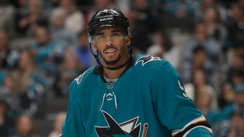 File - In this Oct. 13, 2019, file photo, San Jose Sharks left wing Evander Kane against the Calgary Flames during an NHL hockey game in San Jose, Calif. (AP Photo/Jeff Chiu, File)