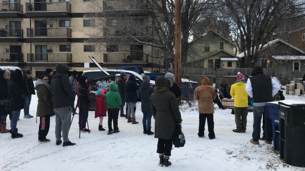 Vigil held in Saskatoon alleyway where dead infant was found