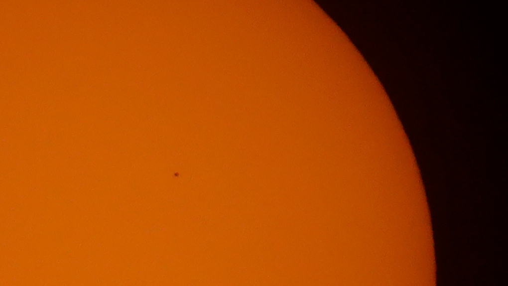 Mercury passes by Sun