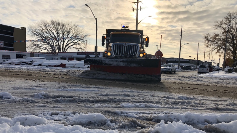 A Windsor snow plow removes snow off Giles Boulevard in Windsor, on Tuesday, Nov. 12, 2019. (Melanie Borrelli / CTV Windsor)