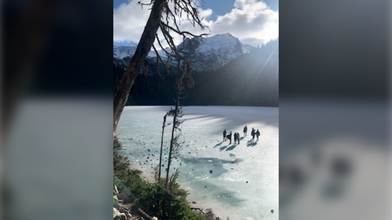 Mounties shared photos of people walking across the ice at Joffre Lakes on Nov. 10, 2019 and are warning people the ice is still too thin. (Whistler RCMP)