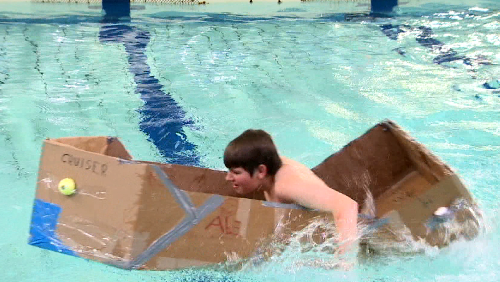 Students learn about about buoyancy at annual Cardboard Boat Race