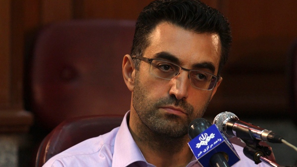 In this photo released by the semi-official Iranian Fars News Agency, Newsweek reporter Maziar Bahari attends a press conference after his trial in Tehran, on Saturday, Aug. 1, 2009. (AP / Fars News Agency, Hossein Salehi Ara)