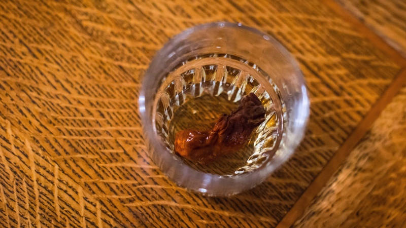 The Sourtoe Cocktail, a shot of whisky with a dehydrated human toe in the drink, is seen at the Downtown Hotel, in Dawson City, Yukon, on Sunday, July 1, 2018. THE CANADIAN PRESS/Darryl Dyck