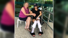 Lexie York with her mother in Cancun hospital 