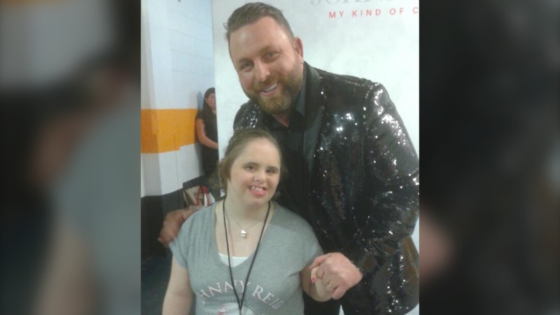 Country star Johnny Reid poses for a photo with superfan Vicki Gould before his concert at Centre 200 in Sydney, N.S., on Nov. 21, 2019. (Lori Gould)