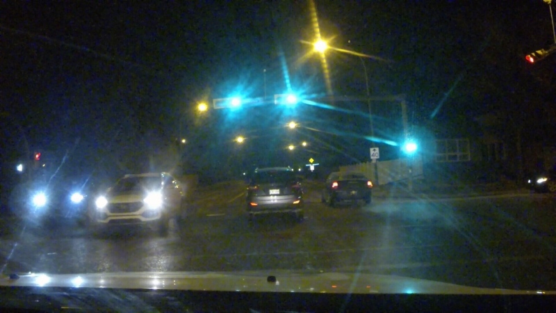 A motorist is shown without their tail lights on after dark on a Regina road. (Gord Fiessel/CTV News Regina)