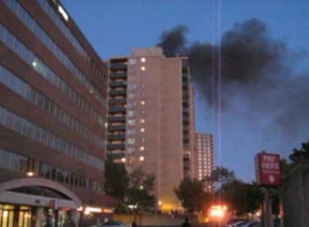 Smoke billows into the air at an apartment building near Billings Bridge, Tuesday, Sept. 8, 2009. (Michael La Pierre/ MyNews.CTV.ca)