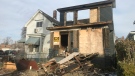 The house at 658 Caron Avenue is being torn down in Windsor, Ont., on Monday, Nov. 25, 2019. (Rich Garton / CTV Windsor)