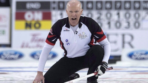 Team Ontario skip Glenn Howard reacts to his final shot in the tenth end during round robin competition against Team Northern Ontario at the Brier curling championship in Ottawa on March 9, 2016. THE CANADIAN PRESS/Adrian Wyld
