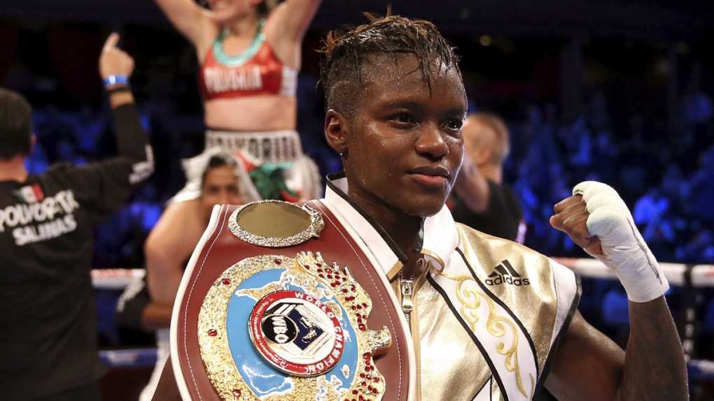 Nicola Adams poses with the belt