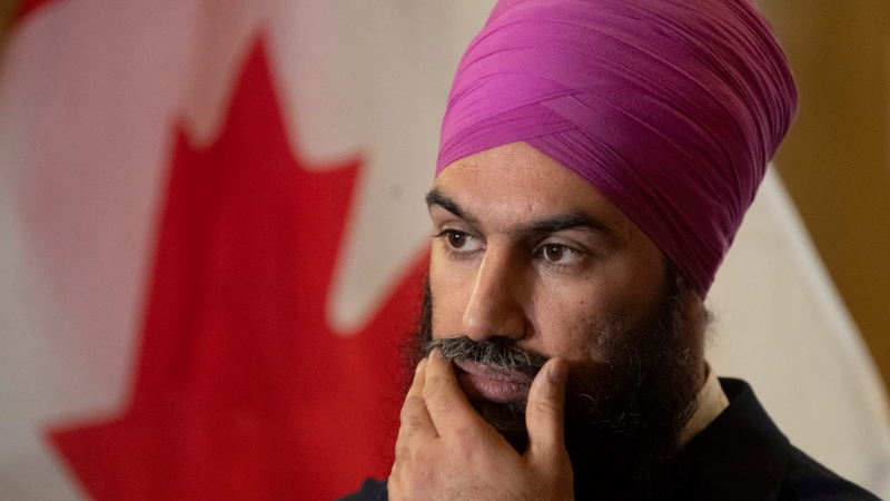 NDP Leader Jagmeet Singh touches his beard as he listens to a question from the media in Ottawa, Wednesday, Nov. 27, 2019. THE CANADIAN PRESS/Adrian Wyld