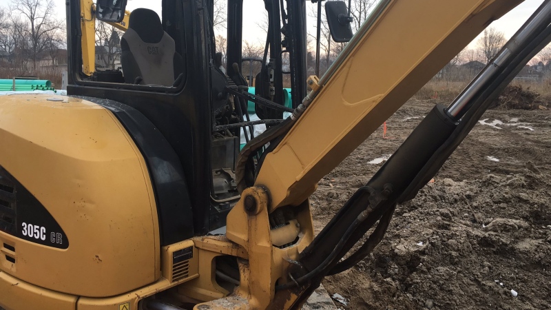 Police are investigating an explosion at a construction site in St. Thomas, Ont. that shattered the windows of an excavator on Saturday, Nov. 30, 2019.
(Brent Lale / CTV London) 