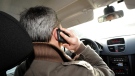 A driver uses a cell phone in this stock photo. (Damien Meyer/Getty Images via CNN)