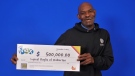 Lynval Baylis of Walkerton, Ont. picks up his lottery winnings at the OLG Prize Centre in Toronto. (Source: OLG)