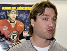 Quebec Remparts head coach and general manager Patrick Roy responds to media questions after a news conference on CHL top prospects Jan. 15, 2007 in Quebec City.  (CP / Jacques Boissinot)