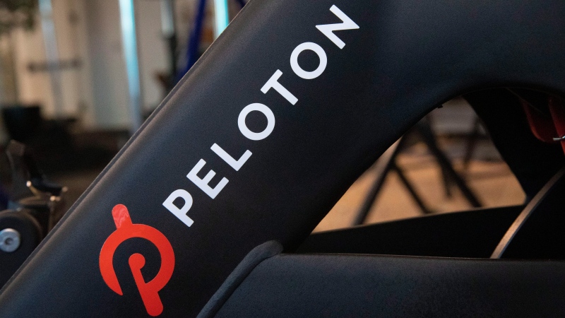 The Peloton logo is displayed on the company's stationary bicycle, Thursday, Sept. 26, 2019 in New York. (AP Photo/Mark Lennihan)