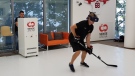 A hockey player uses the Sense Arena virtual reality training system in this handout image. (Sense Arena)