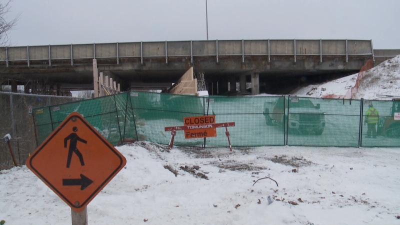 Work continues as crews get ready to replace the Highway 417 bridge over the O-Train tracks in July.