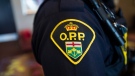 An Ontario Provincial Police crest is displayed on the arm of an officer during a press conference in Vaughan, Ont., on Thursday, June 20, 2019. THE CANADIAN PRESS/Andrew Lahodynskyj