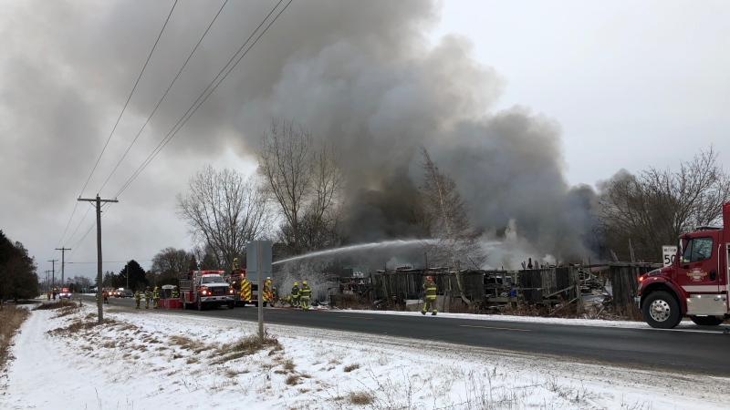 Smoke billows from a fire at a scrapyard in Malahide Township, Ont. on Thursday, Dec. 19, 2019. (Source: Brent Smith / Malahide Fire Services)