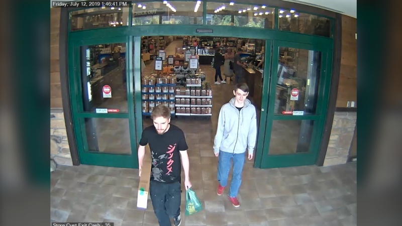 A new image from the warrant applications obtained by CTV News shows Kam McLeod and Bryer Schmegelsky walking out of Cabela's on July 12 when they were said to have bought a gun. 