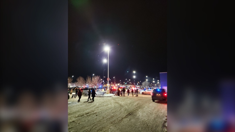 A photo posted to Twitter shows a heavy police presence at the south Wal-Mart in Red Deer, Alta., amid an ongoing incident. Dec. 20, 2019. (Twitter/@buddhacanvas)