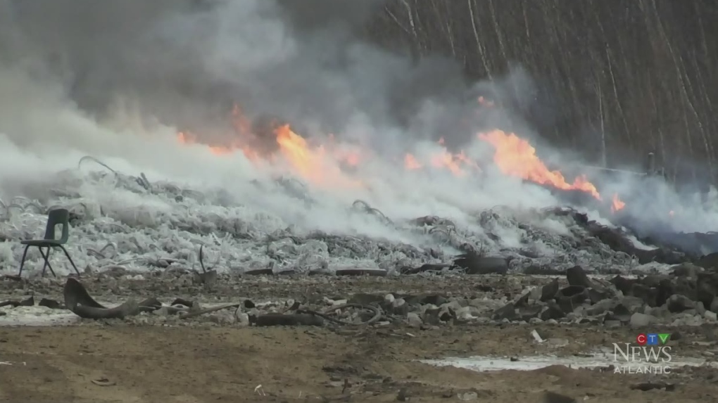 Crews continue fight to stop Minto tire fire