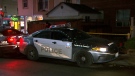 A Toronto police cruiser is seen outside of a home in the city's Harbord Village on Sunday. (CTV News Toronto)